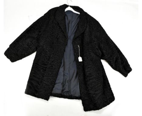 A 1950s short length Astrakhan/Persian lamb fur coat.Additional InformationGeneral wear, but no signs of major damage or moth
