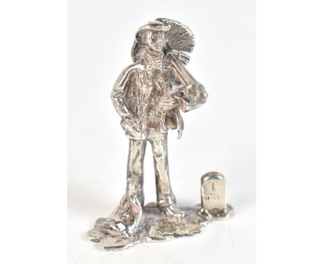 THOMAS CHARLES JARVIS; an Elizabeth II hallmarked silver miniature figure of a vagabond standing beside a mile marker, London