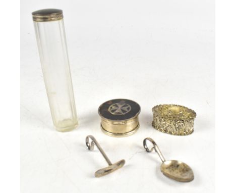 A group of hallmarked silver including an oval lidded box with repoussé scrolling decoration surrounding a vacant cartouche b