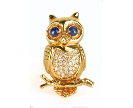 An 18ct yellow gold Athenian owl brooch in the manner of Boucheron set with cabochon sapphires for eyes and with thirty diamo