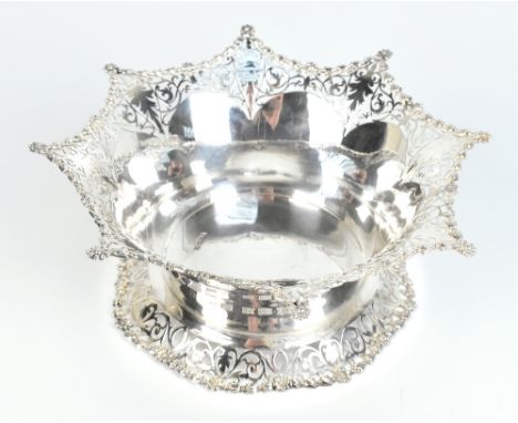 COOPER BROS &amp; SONS LTD; a George V hallmarked silver bowl with pierced rims and a cast floral border, Sheffield 1913, app