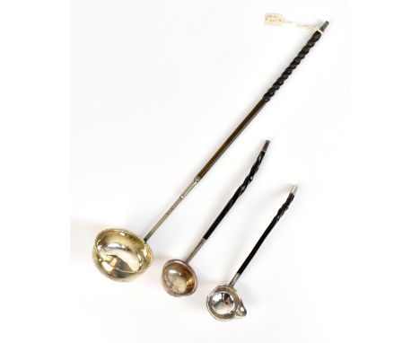 A Georgian hallmarked silver toddy ladle with baleen handle, marks rubbed, length 35cm, and two smaller examples, one Scottis