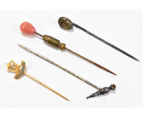 Four assorted base metal stick pins including a crown finial example inscribed 'Greek Wine', each fitted in one case.Addition