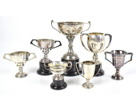 A George VI hallmarked silver twin handled trophy cup inscribed 'Dunham Forest Golf &amp; Country Club, Bernard Cassell Troph