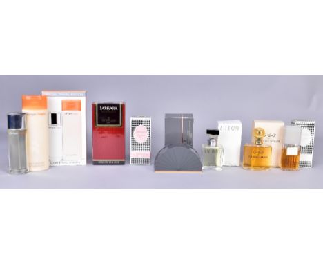 A group of perfumes and soaps including bottles of Christian Dior perfume, Guerlain perfume, Giorgio Armani, Karl Lagerfeld s