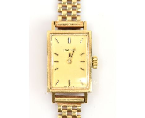 LONGINES; a lady's 9ct gold wristwatch, the rectangular dial set with batons, with 9ct gold strap, approx 20g.Additional Info
