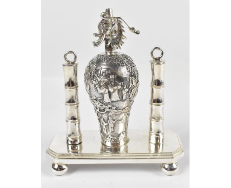 WANG HING (probably); a circa 1900 Chinese export table cigarette lighter modelled as a vase decorated with figures in landsc