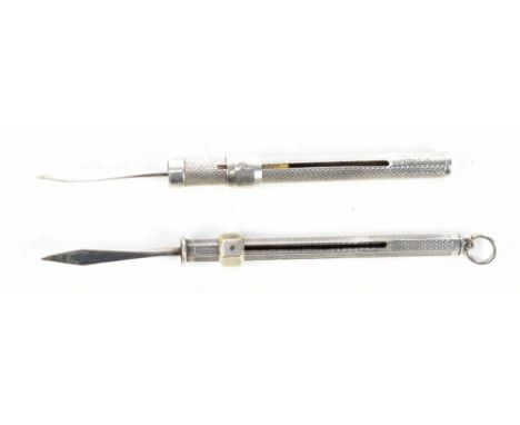 An Elizabeth II hallmarked silver handled tooth pick, maker’s mark indistinct, Birmingham 1987, and a further example stamped