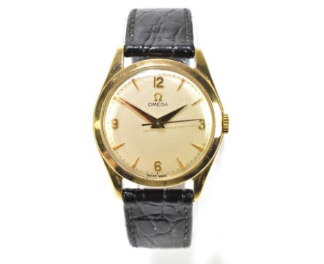 OMEGA; a gentleman's 9ct cased manual wind wristwatch, with quarter Arabic numerals and batons, diameter of dial excluding wi