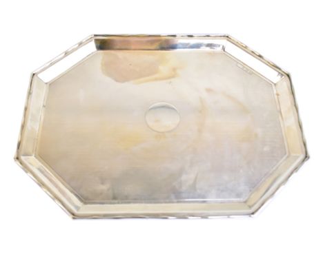 A George V hallmarked silver tray of octagonal form with engine turned decoration to main panel and with central vacant circu