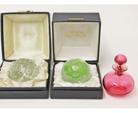 Two Caithness glass paperweights and a ruby glass scent bottle. Condition - good, no damage, general wear only.