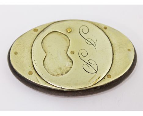 An early 19th Century mahogany and brass snuff box, length 6.8cm. Condition good, general wear.