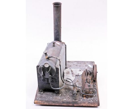 A Stuart model mill engine and babcock boiler mounted on wooden base. Condition - poor, rusty, needs attention.