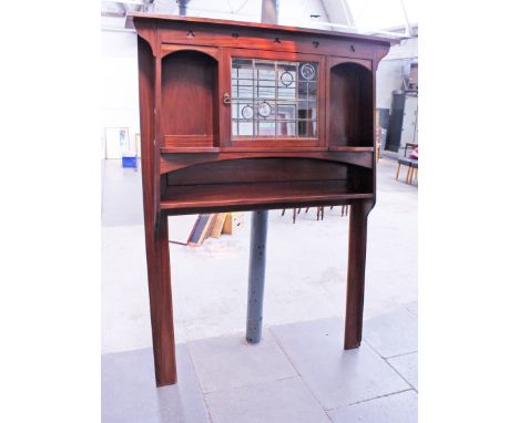 An Arts & Crafts mahogany fire surround circa 1900. W151cm D21cm H199cm