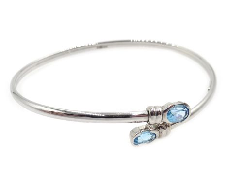 White gold blue topaz bangle, hallmarked 9ct Condition Report Approx 3.9gm