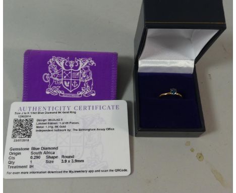 A 1/4ct Blue Diamond 9ct Gold ring, Size J/K with Certificate 