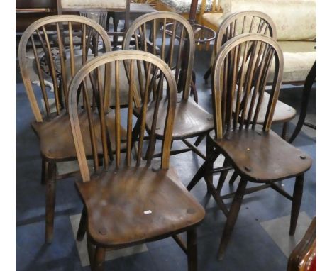 A Set of Five Good Quality Elm Seated Stick Back Dining Chairs by Gomm of High Wycombe Stamped W52 