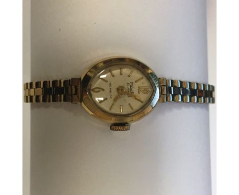 LADY'S NINE CARAT GOLD MAJEX WRIST WATCH the dial with baton and Arabic numerals, on a nine carat gold bracelet strap, 14.3g