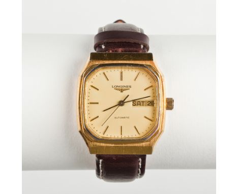 GENTLEMAN'S GOLD PLATED LONGINES AUTOMATIC WRIST WATCH
the octagonal dial with baton numerals and day/date aperture, on a bro