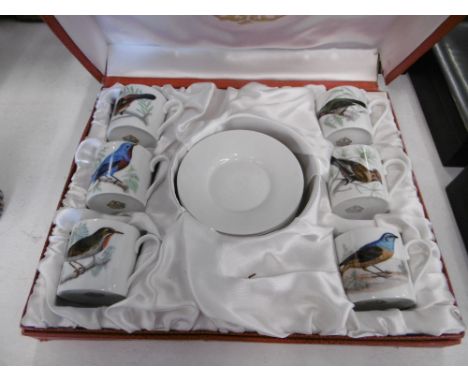BOXED SET OF SIX FABRIQUE LIMOGES COFFEE CUPS AND SAUCERS
