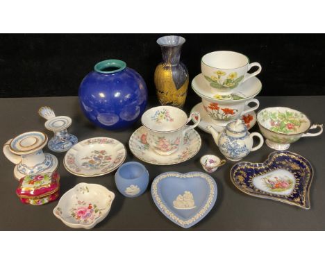 A Meissen chamber stick; a Sevres heart shaped dish, a reproduction miniature Royal Worcester teapot; a studio glass vase; We