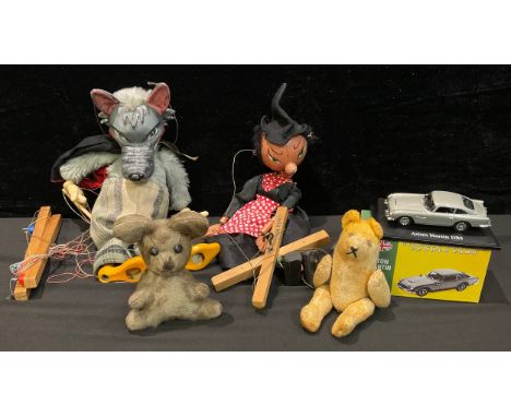 A Pelham puppet, Wolf, 36cm; another Witch; a miniature jointed mohair bear; another small Teddy bear; an Atlas Editions, rep