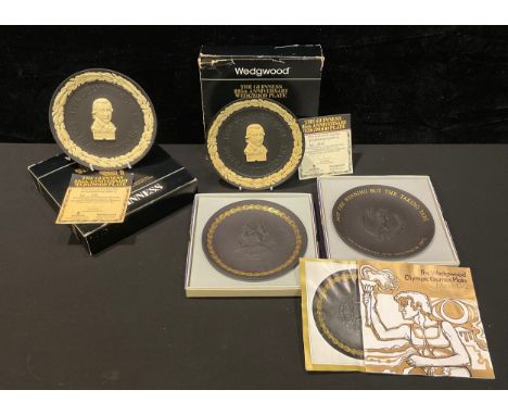 A Wedgwood black Jasperware Guinness plate, boxed; another Guinness plate, boxed; two plates, Mother's day and 1972 Olympics,