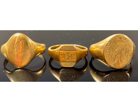 A 9ct gold signet ring, size O, two others, sizes N and K, monogrammed, 12.3g (3) 