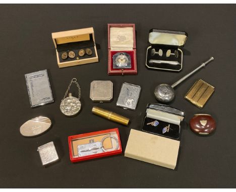 A miniature easel travel clock, cased; chrome engine turned visiting card case; a pair of silver cuff lings, cased; a Coty po