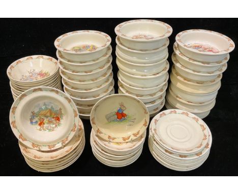A large collection of Royal Doulton Bunnykins nursery ware, cups, mugs, money banks, plates, etc 