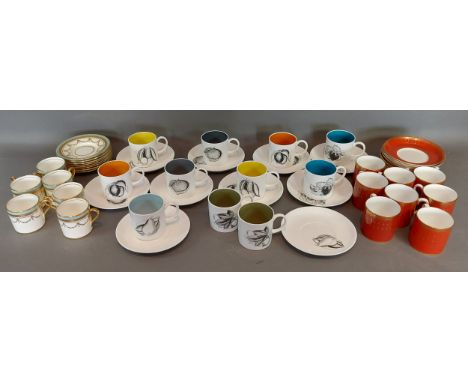 A Susie Cooper coffee set comprising eleven cups and ten saucers together with a Spode coffee service and another by Aynsley 