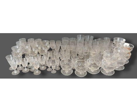 A collection of glassware, mainly drinking glasses