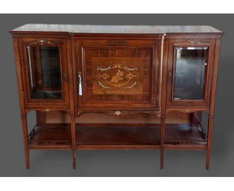 A 19th Century Rosewood and marquetry inlaid chiffonier with a central door flanked by glazed doors with undertier raised upo