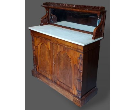 A William IV Rosewood chiffonier, the pierced galleried and mirrored back above a marble top with frieze drawer and two cupbo