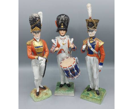 A Dresden figure, Coldstream Guards together with another Scots Guards and another Drummer Goldstream Guards