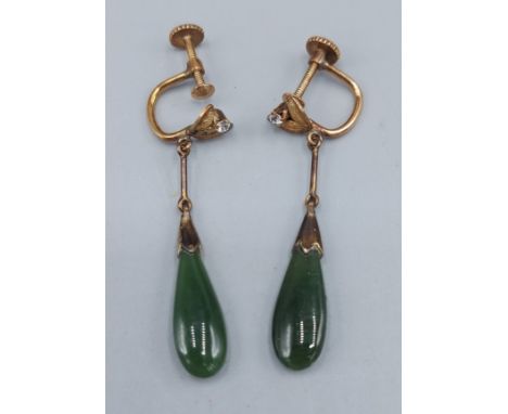 A pair of 14ct gold drop earrings each set with a Jade drop 