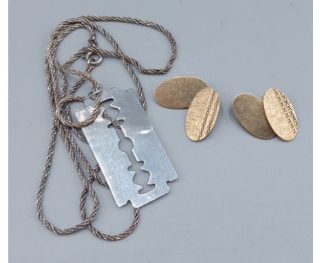 A pair of 9ct gold cufflinks, 4.9gms together with a pendant in the form of a razor blade with linked chain