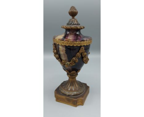 A French Amethyst and Quartz Ormolu mounted Urn with Pineapple finial and shaped pedestal base, 21cms tall