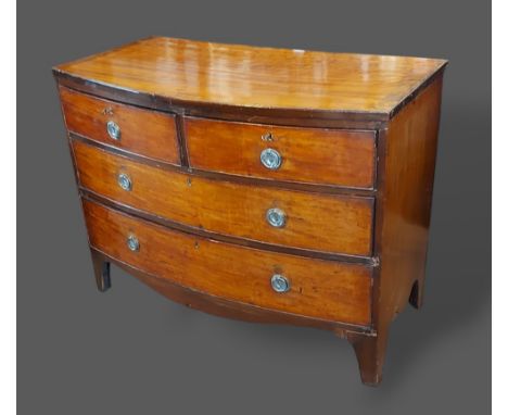 A 19th Century mahogany bow fronted chest of two short and two long drawers raised upon bracket feet, 103cms wide, 51cms deep