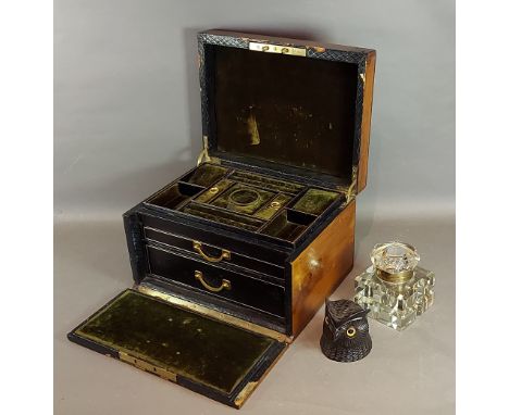 A Victorian dressing case, the hinged top enclosing a fitted interior together with a Black Forest inkwell in the form of an 