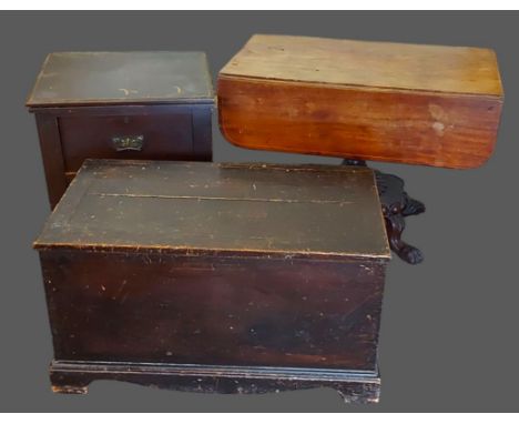 A 19th Century mahogany breakfast table together with a pine trunk and a Victorian two drawer chest 