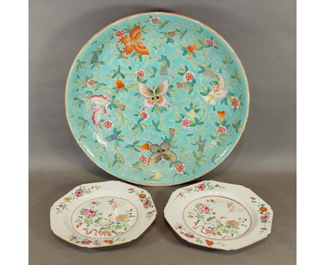 A Chinese deep dish with Famille Rose decoration, red seal mark to base together with a pair of Chinese octagonal plates