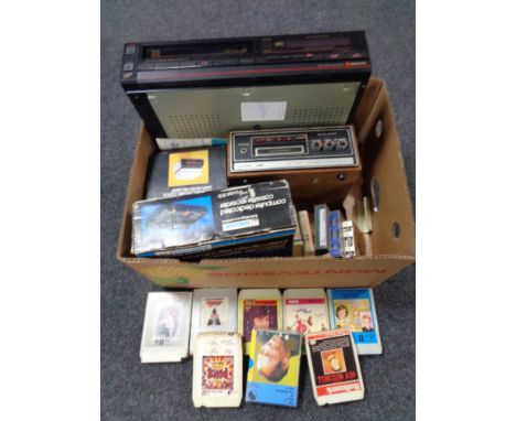 A box of Samsung video cassette recorder, Kyoto S600 eight track player with cassettes, computer dedicated recorder etc  