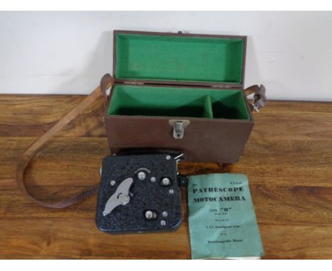 A leather cased Pathescope Motocamera type II cine camera with instruction book 