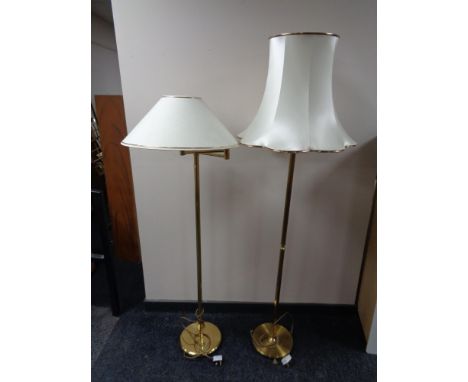 A brass angle poise floor lamp together with a brass standard lamp with shade 