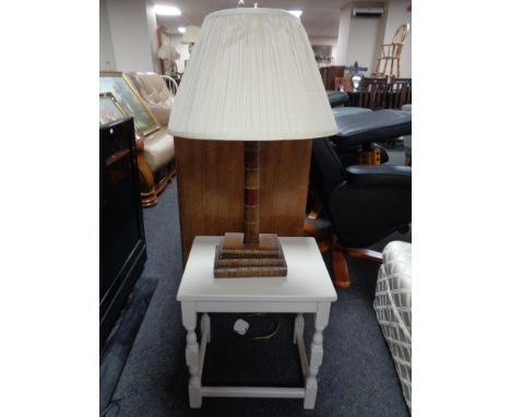 A painted occasional table together with a contemporary table lamp with shade in the form of books 