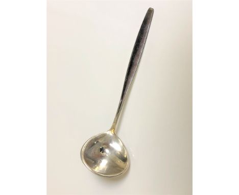 A George Jensen silver ladle 