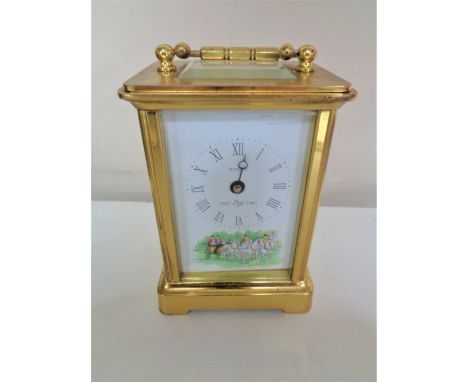 A brass cased Rapport carriage clock 