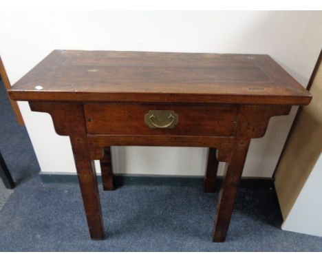 A Chinese style console table fitted with a drawer 