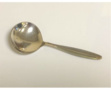 A George Jensen silver caddy spoon